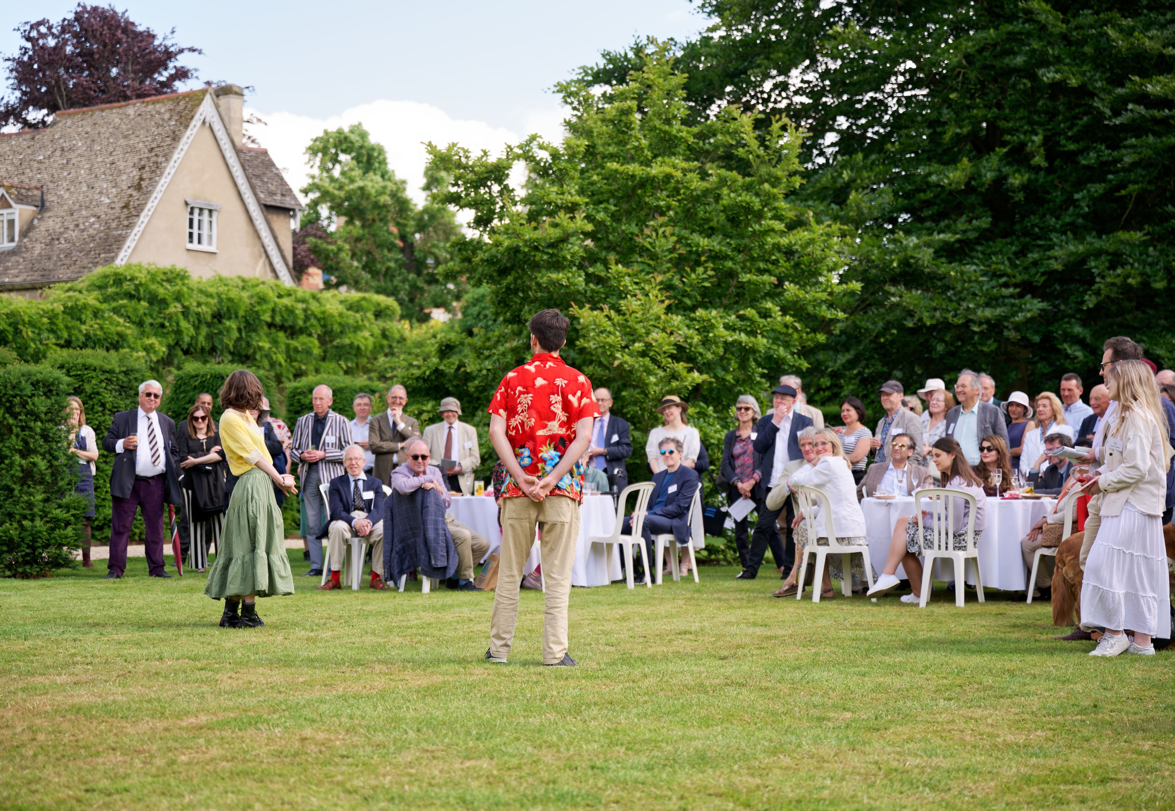 Buskins cast performing outside at the Donors' Garden Party