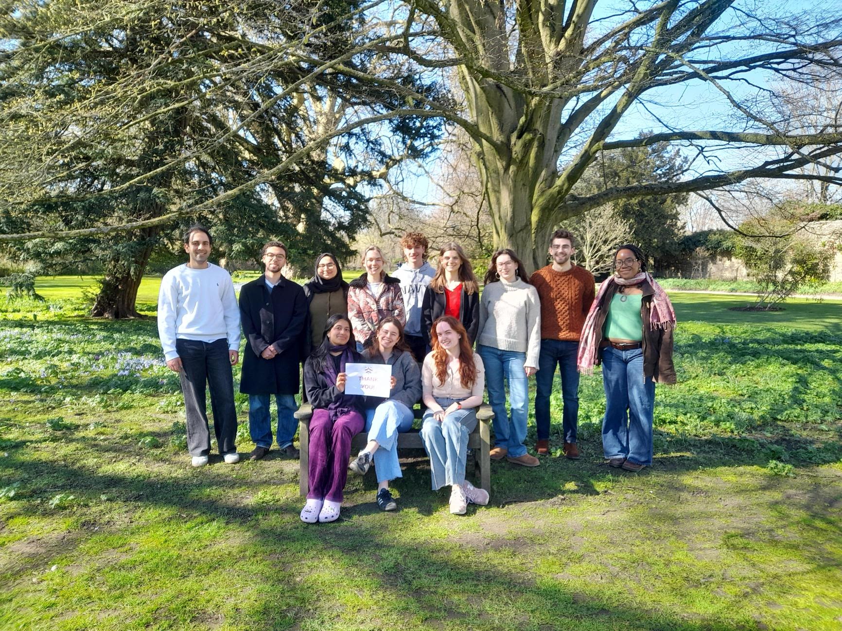Students holding a sign saying thank you